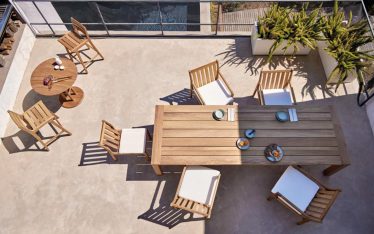 Taula i cadires de Teka